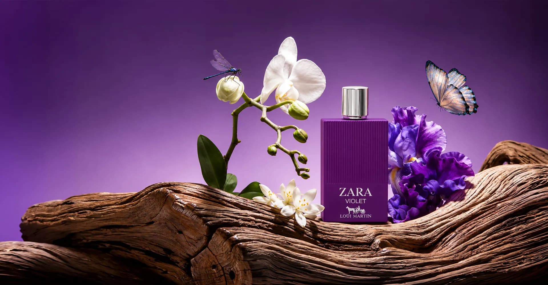 Loui Martin Zara Violet perfume on driftwood with white orchid, purple iris and a butterfly